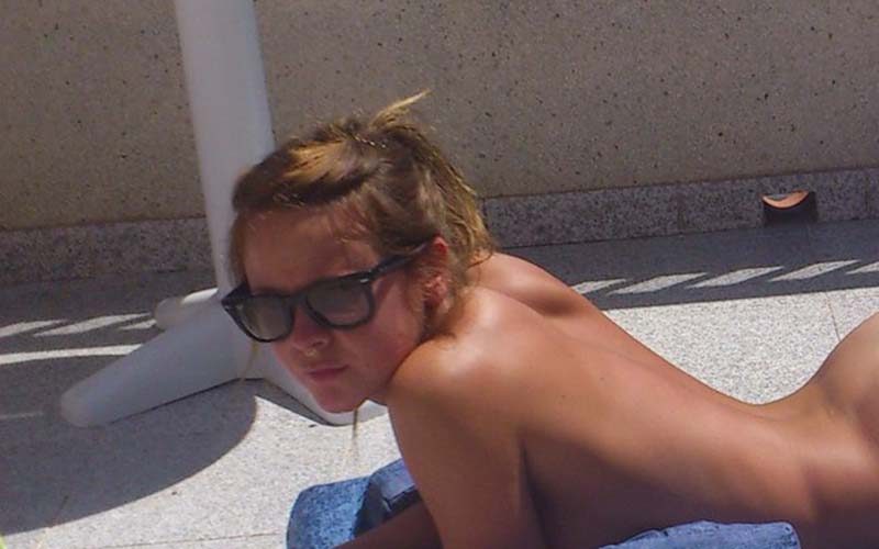 sunbathing nude